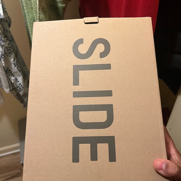 Yeezy slides never worn , have extra pair.  Will ship main image 6